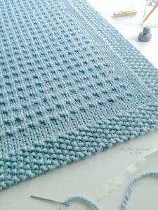 Picture of blue knit baby blanket